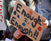 student protesters with signs