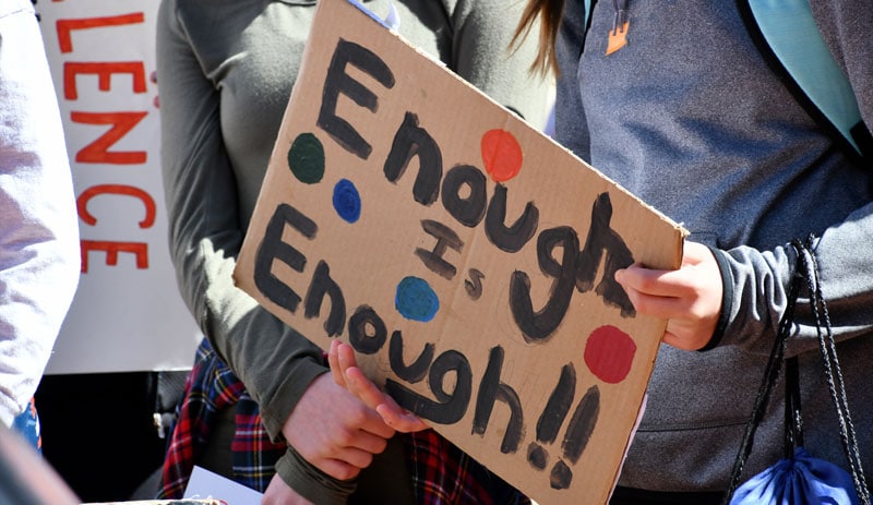 student protesters with signs